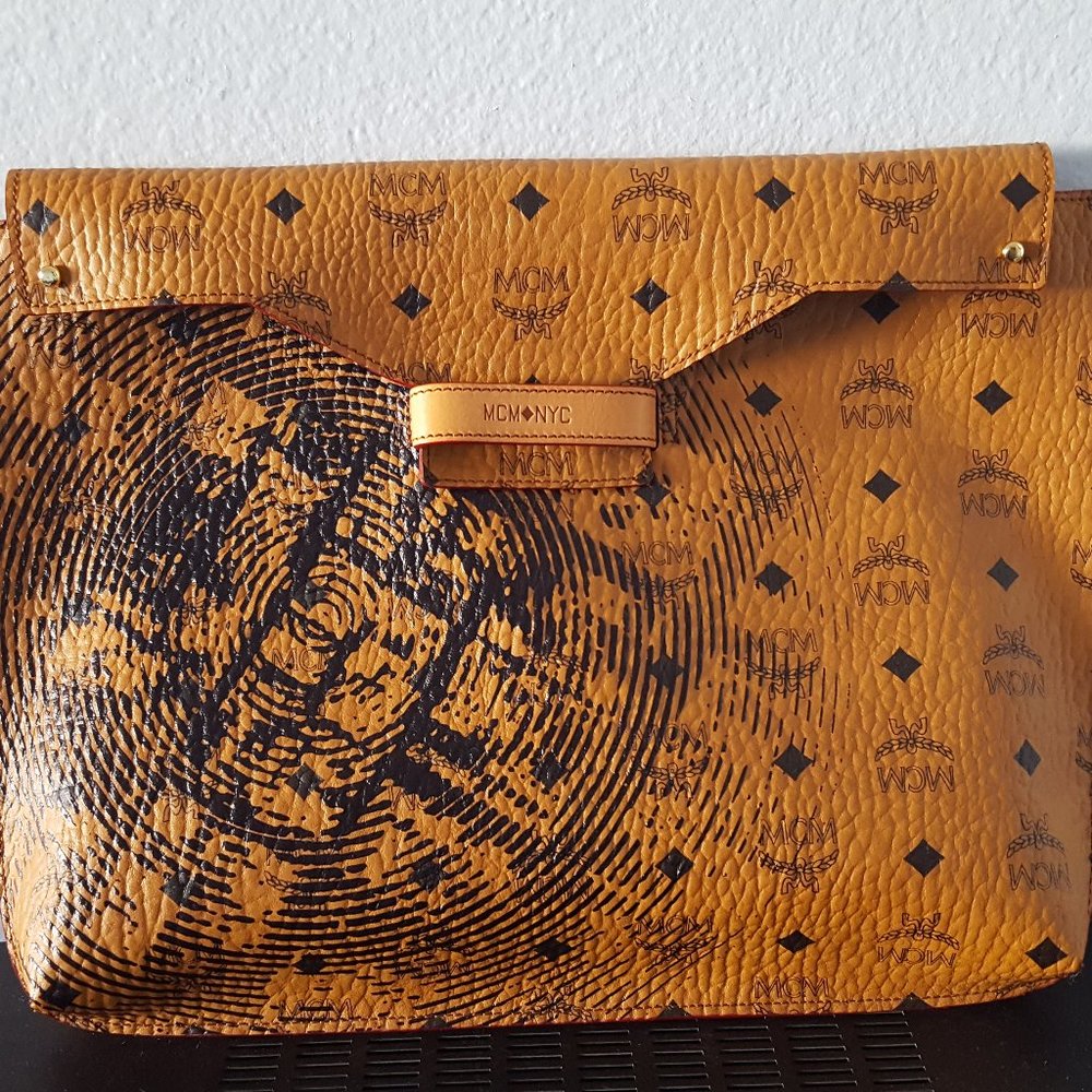 MCM  Limited Edition Coachella Kylie Jenner New Leather Clutch  14.75"L x 11"W